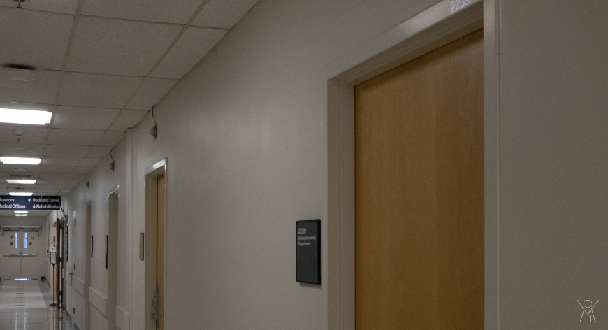 Bob hiding in women's restroom.